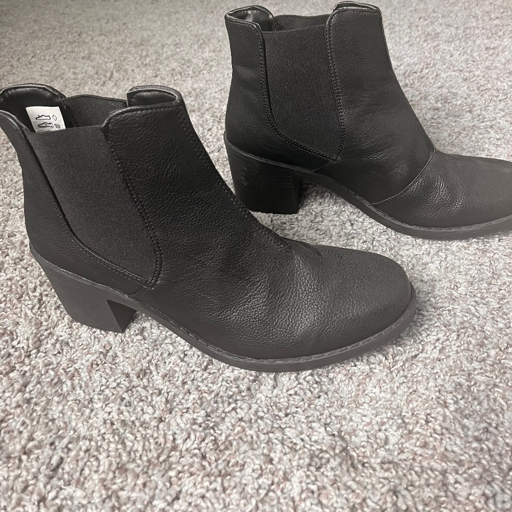 Black heeled leather booties